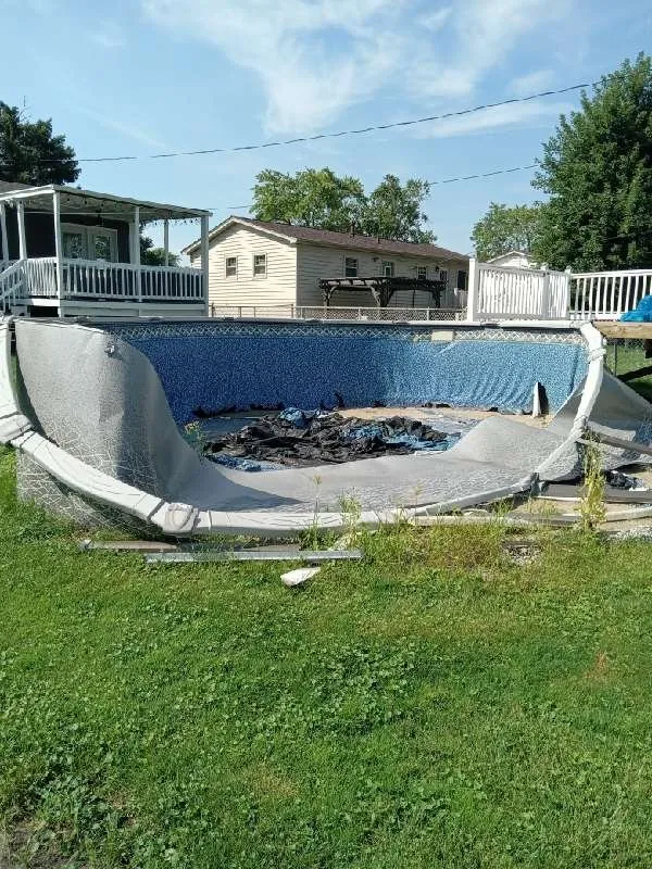 Before: the pool walls and liner up close (pool removal, Oak Forest)