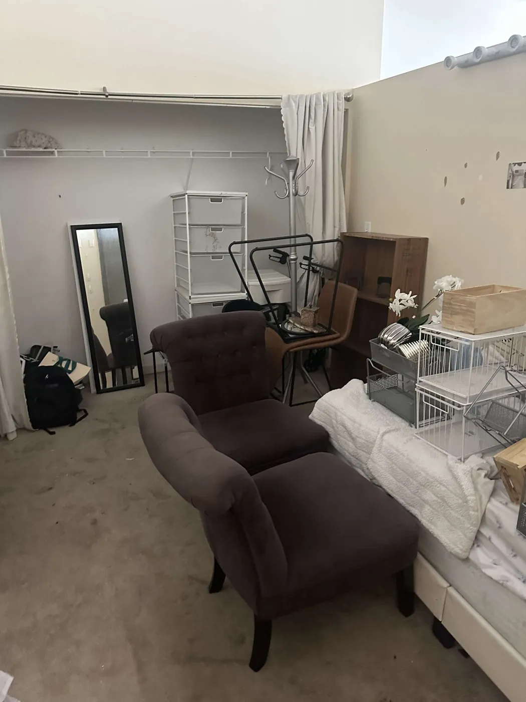 Before: bedroom with chairs, shelves and bed (condo cleanouts, South Loop)