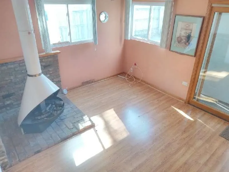After: the same living room, empty (estate cleanouts, Hickory Hills)