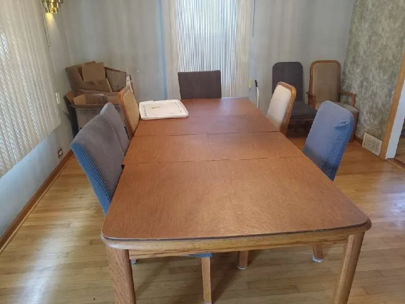 Before: dining room table and chairs (estate cleanouts, Hickory Hills)