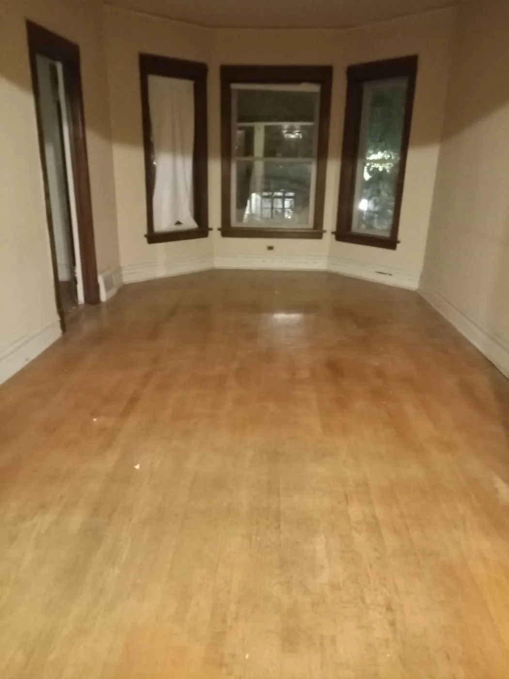 After: the front room, cleared (estate cleanouts, North Center)