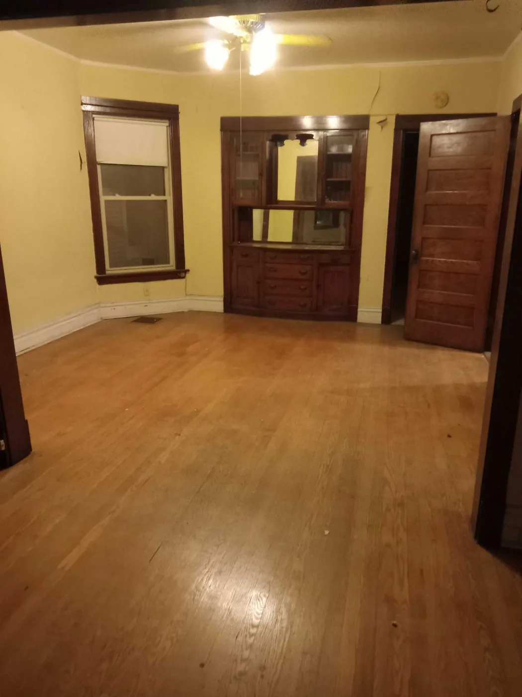 After: the same dining room, empty (estate cleanouts, North Center)