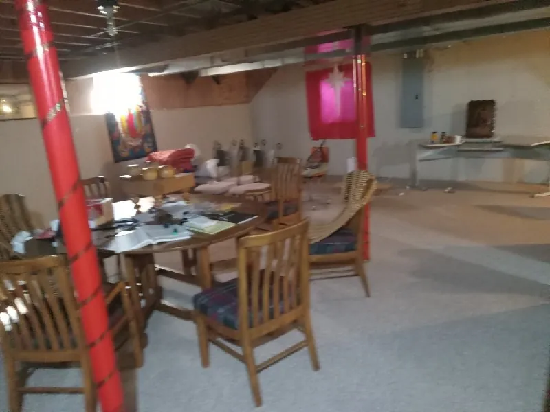 Before: finished basement with dining set (estate cleanouts, Lemont)