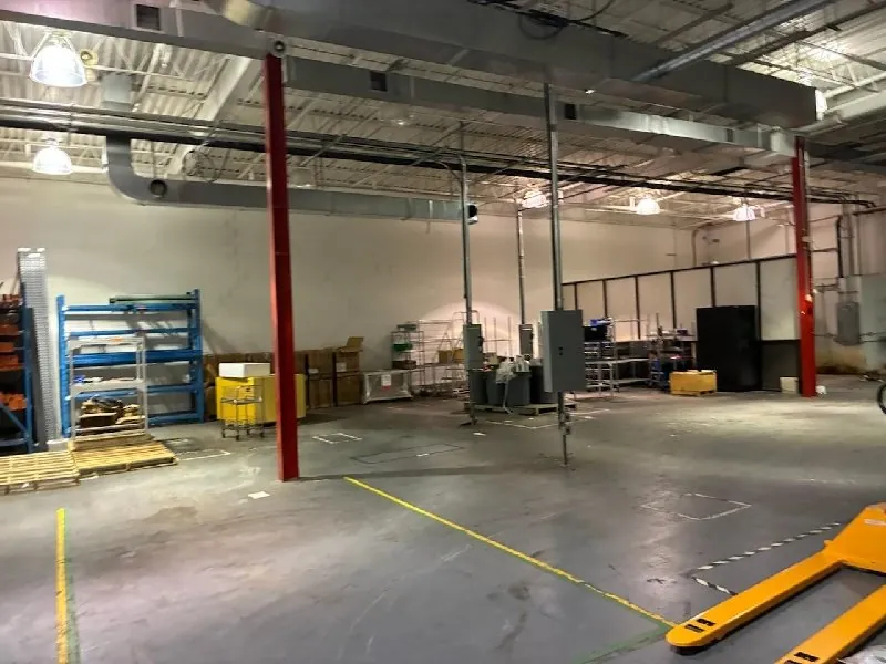 After: the plant floor, open and clear (commercial junk removal, Harwood Heights)