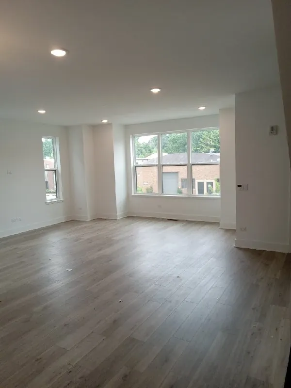 After: the main floor, empty (furniture removal, Morton Grove)