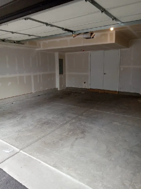 After: the same garage, empty (furniture removal, Morton Grove)