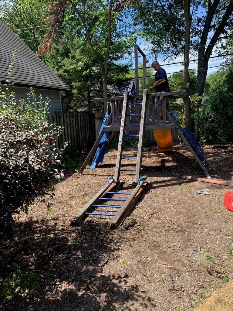 Junk Relief Team Removing a swing set