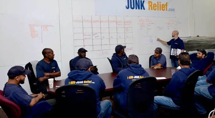 Junk Relief Daily Crew Meeting