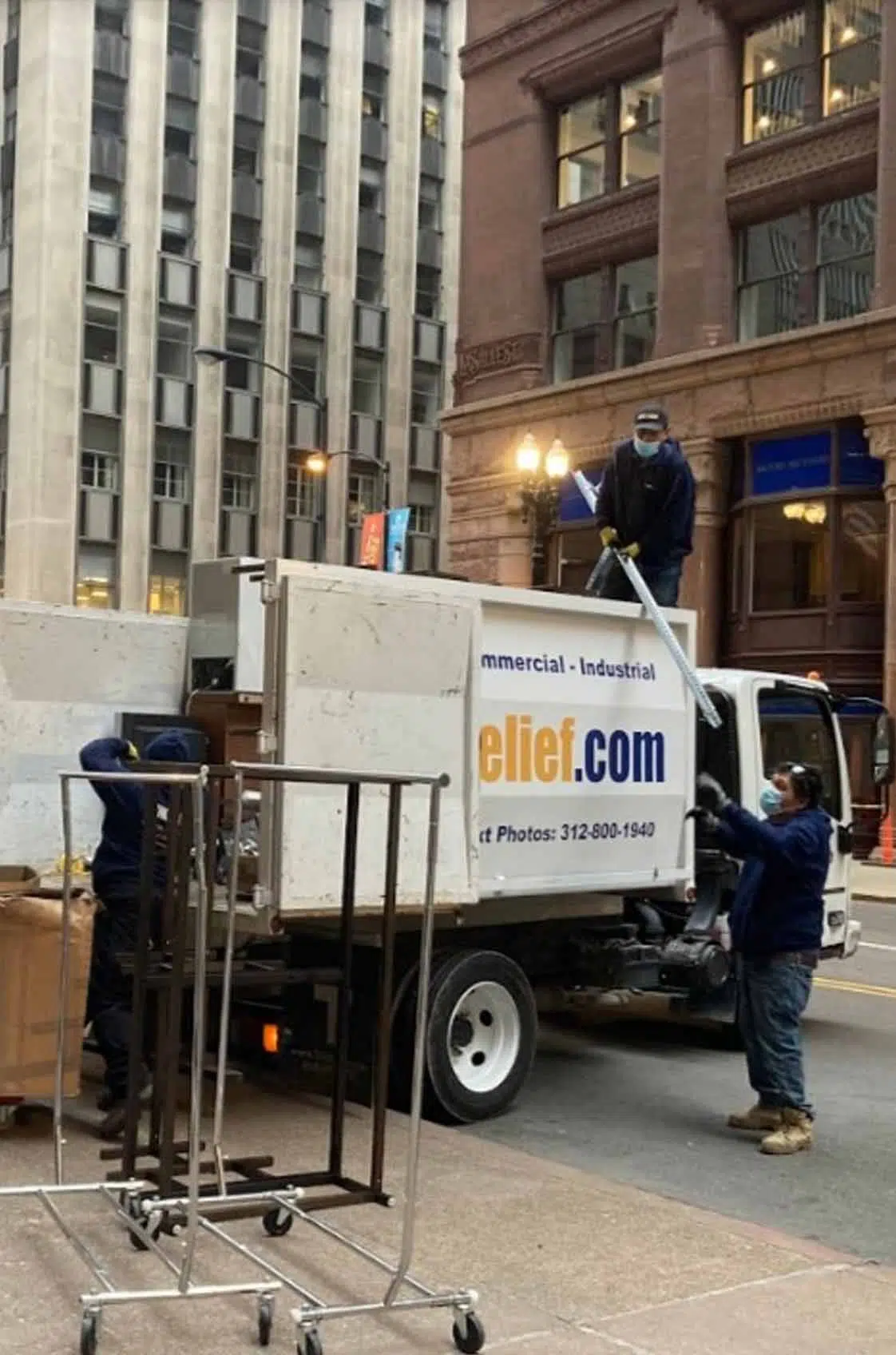 A commercial junk removal project in down town Chicago with high rise buildings in the background | Junk Relief Chicago