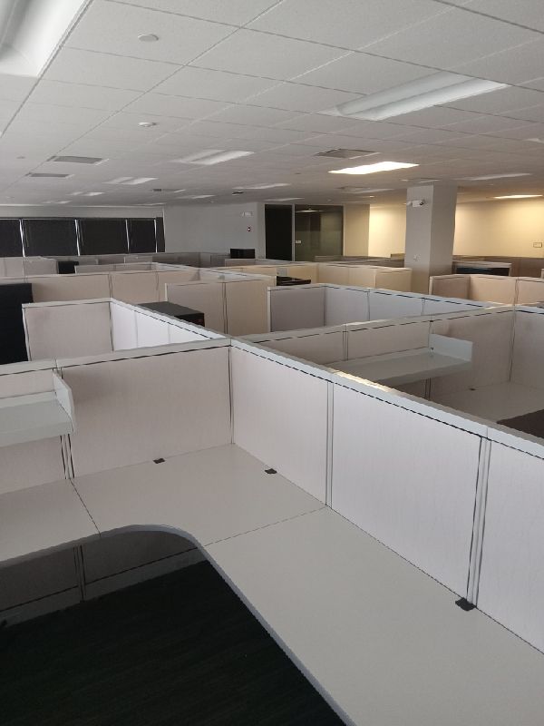 Before: rows of cubicles across the open floor