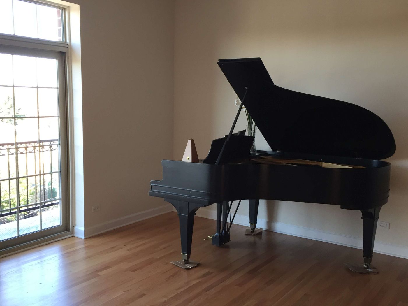Before: the grand piano in the front room