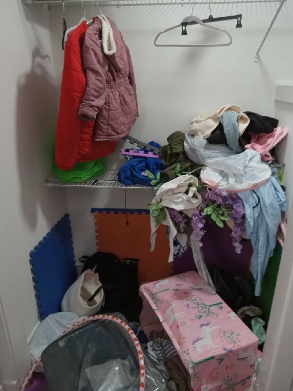 Before: closet contents left behind