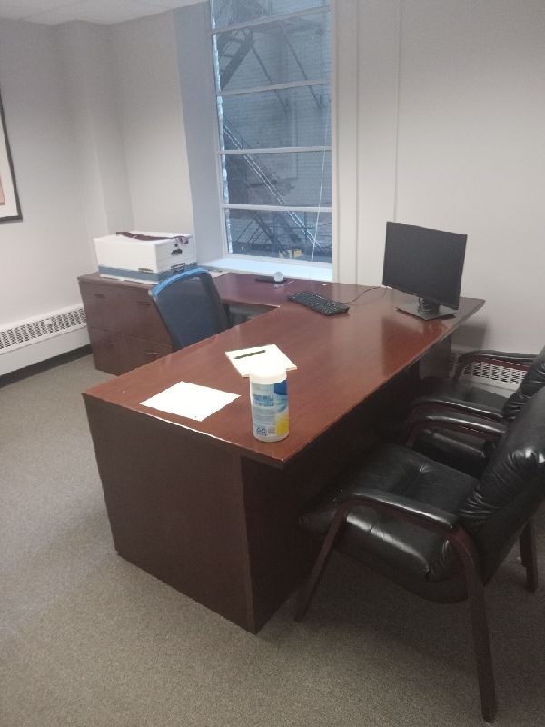 Before: executive desk, credenza and chairs