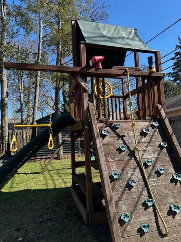 Before: the tower with rock wall and canopy