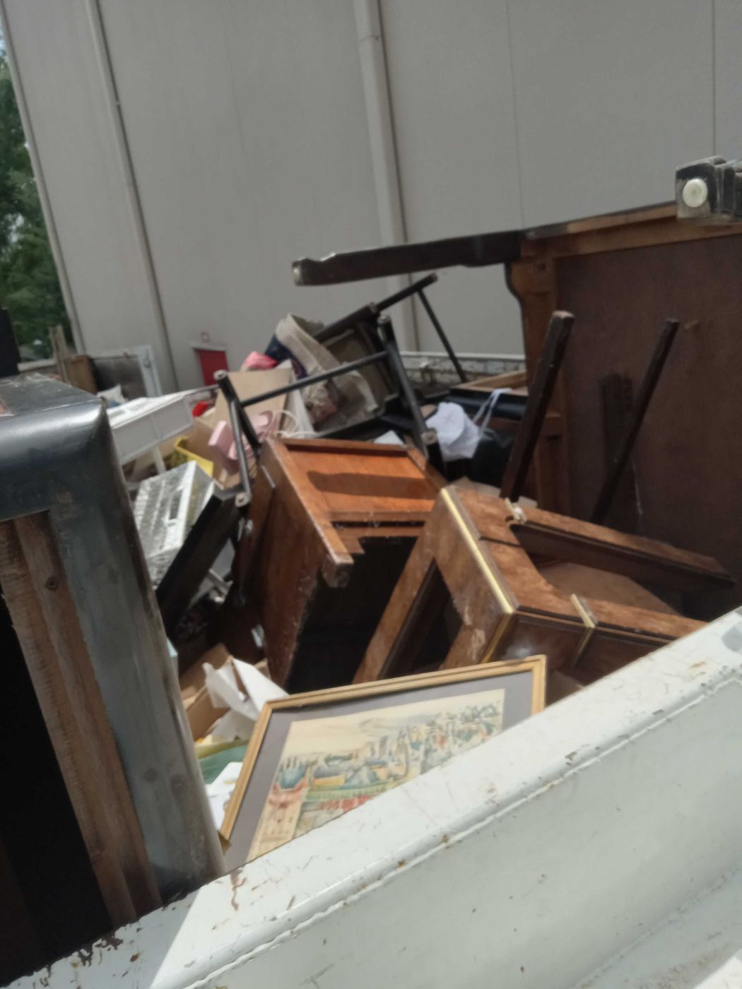 Loaded: furniture and framed art going onto the truck